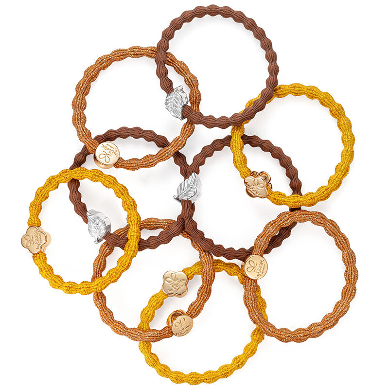 Amber Metallic Hair Band with Gold Circle Charm by eloise