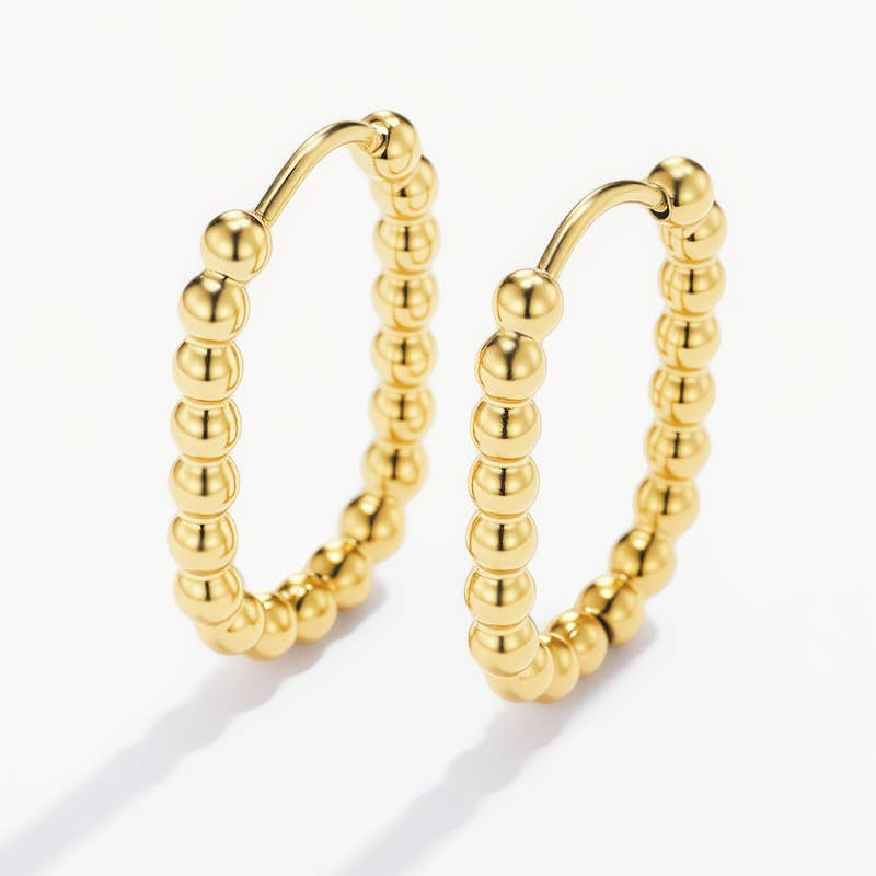 Gold hoop earrings with beaded design