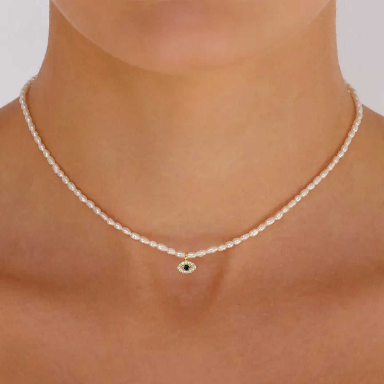 pearl choker necklace evil eye charm
