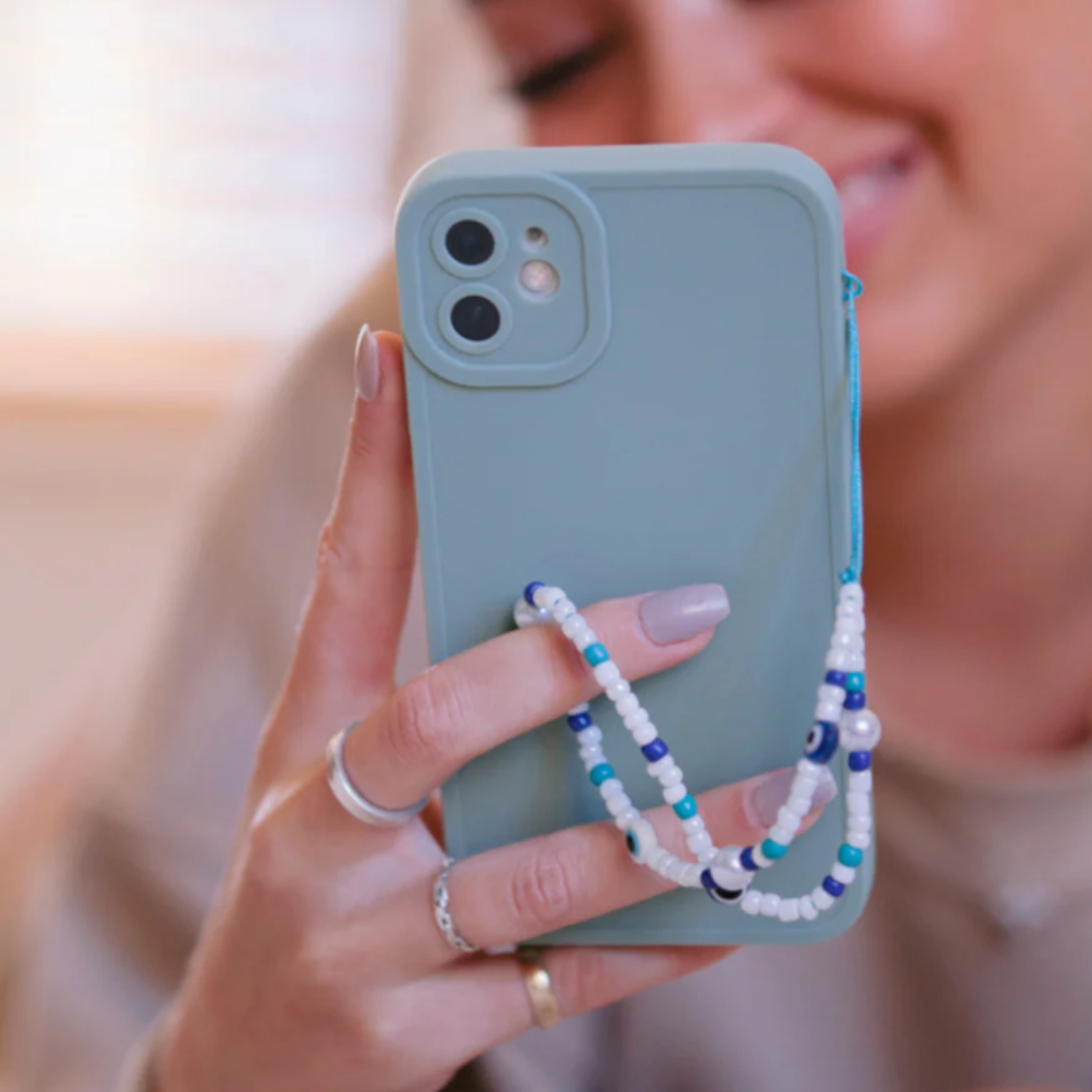 COCONUT LANE | Beaded Blue and White Evil Eye Phone Strap